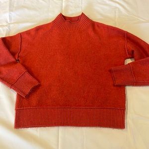 High neck sweater. Great for a cozy Fall look.